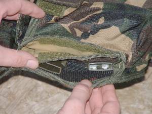 The waist closure koch fastners, and the map pocket.