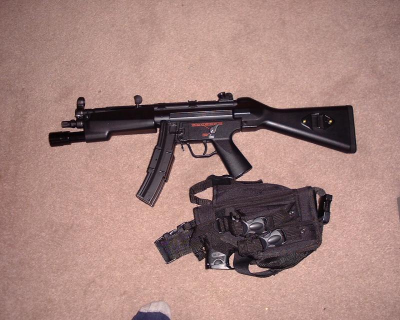 MP5A4 with navy tac light foregrip.