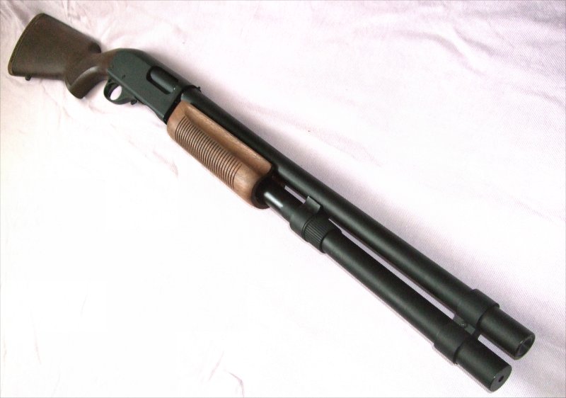 G&P M870 with long barrel and mag extension wood furniture..