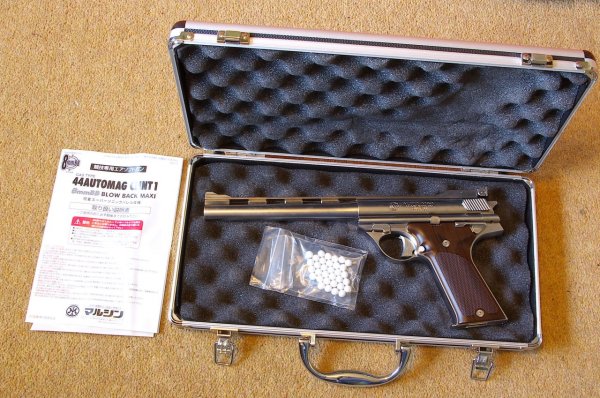 ...conceals alloy and plastic gun case inside - Feature of the Silver gun only