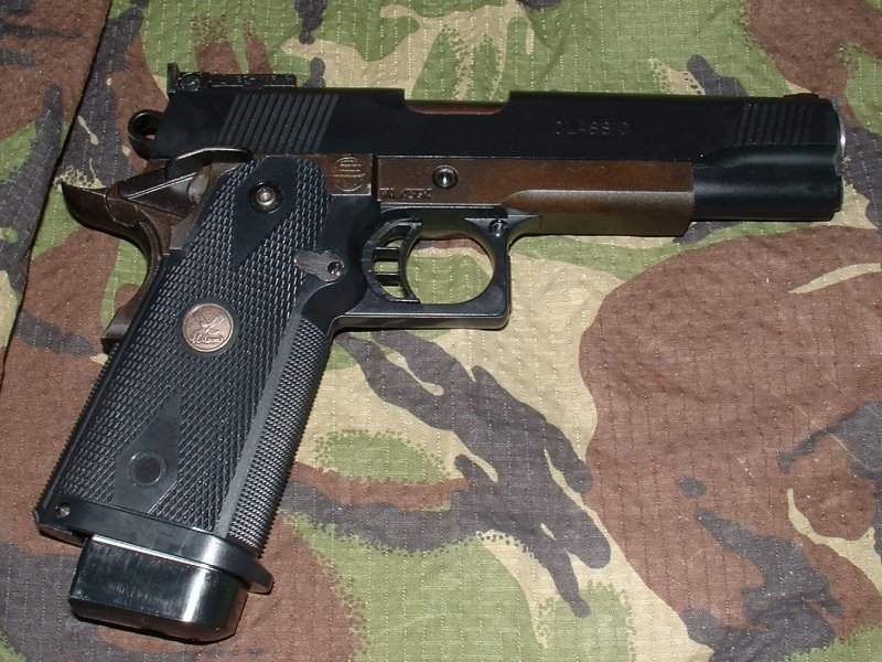 Wilson markings and traditional 1911 style slide distinguish this gun.